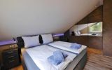 Fewo Steingrotte - Schlafzimmer 1 mit Boxspringbett (180x200)